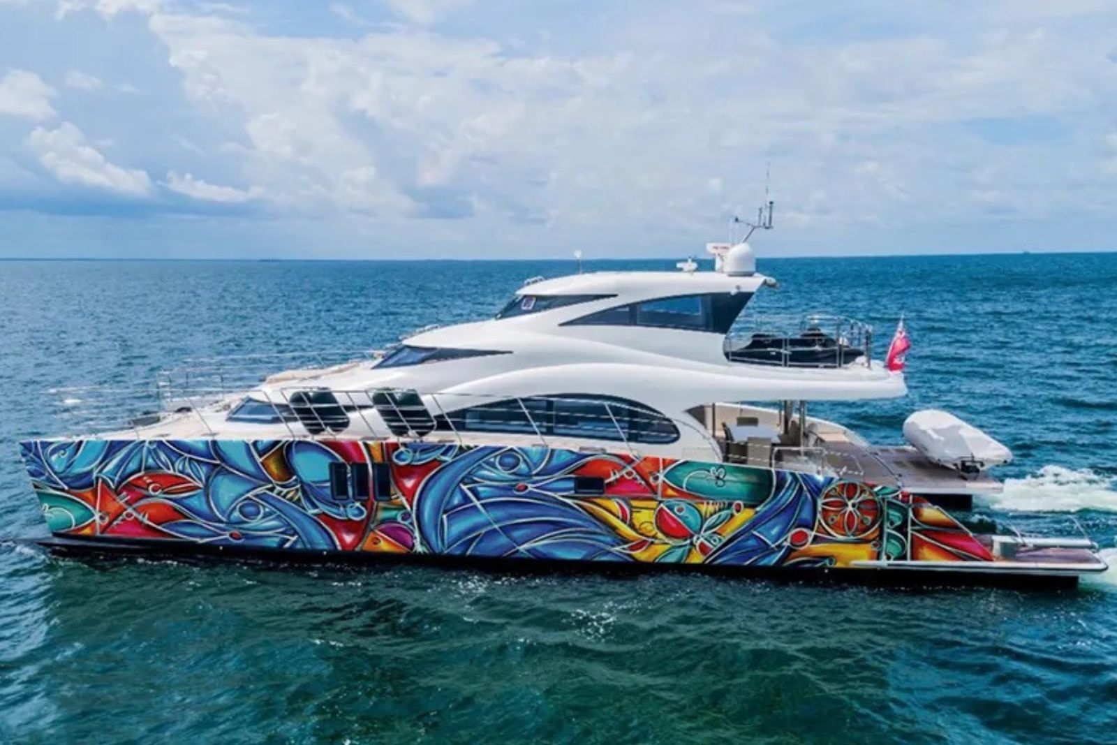 Art Basel Yacht — colorful art-wrapped luxury yacht