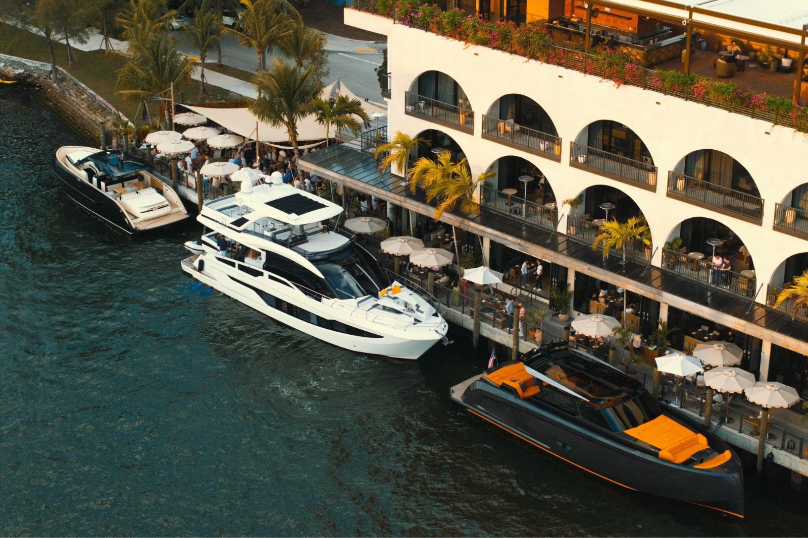 Dock-to-Dock Arrival — yachts at Miami waterfront restaurant