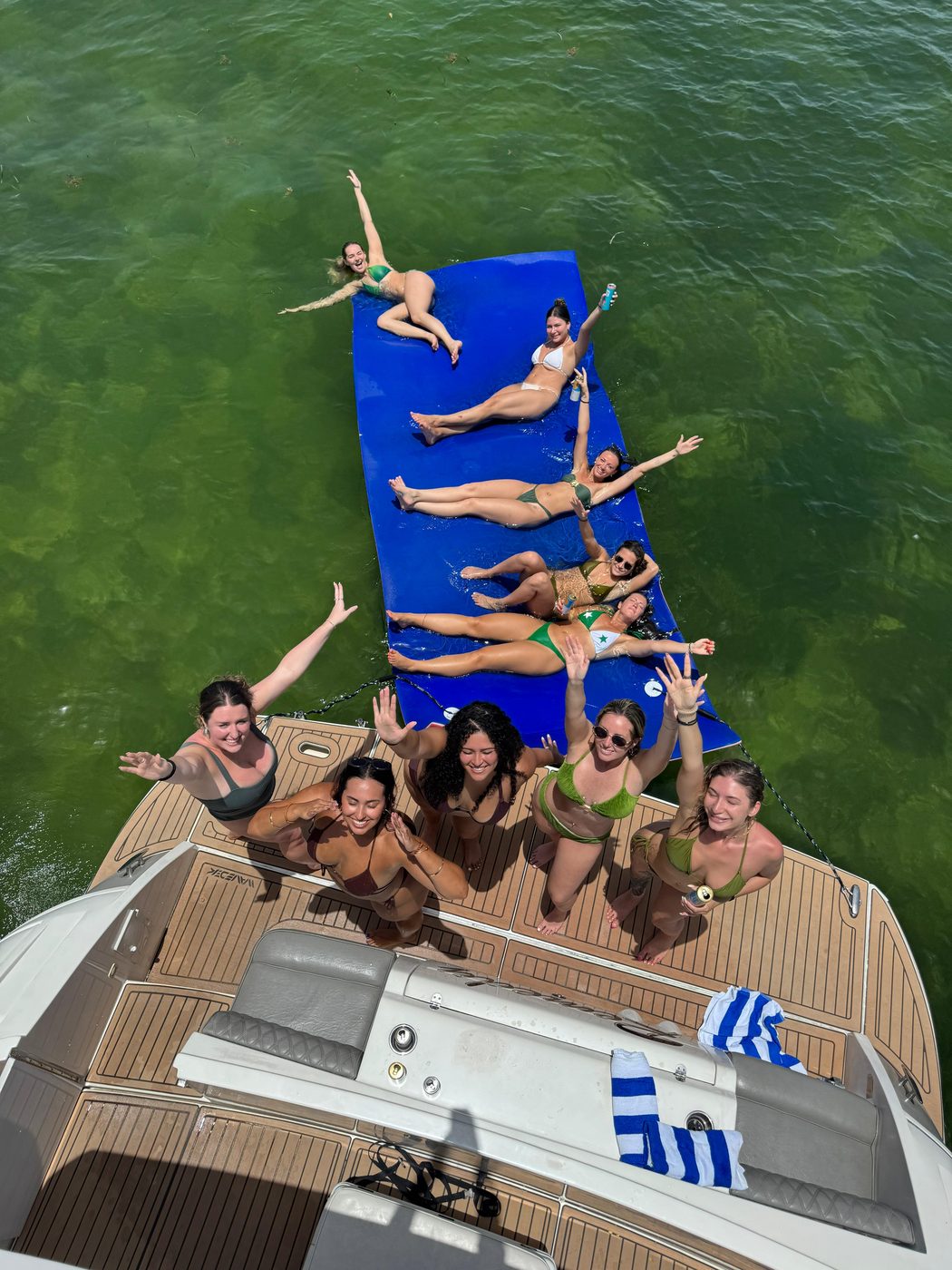 Floating mat beside a yacht anchored at Nixon Sandbar, Miami