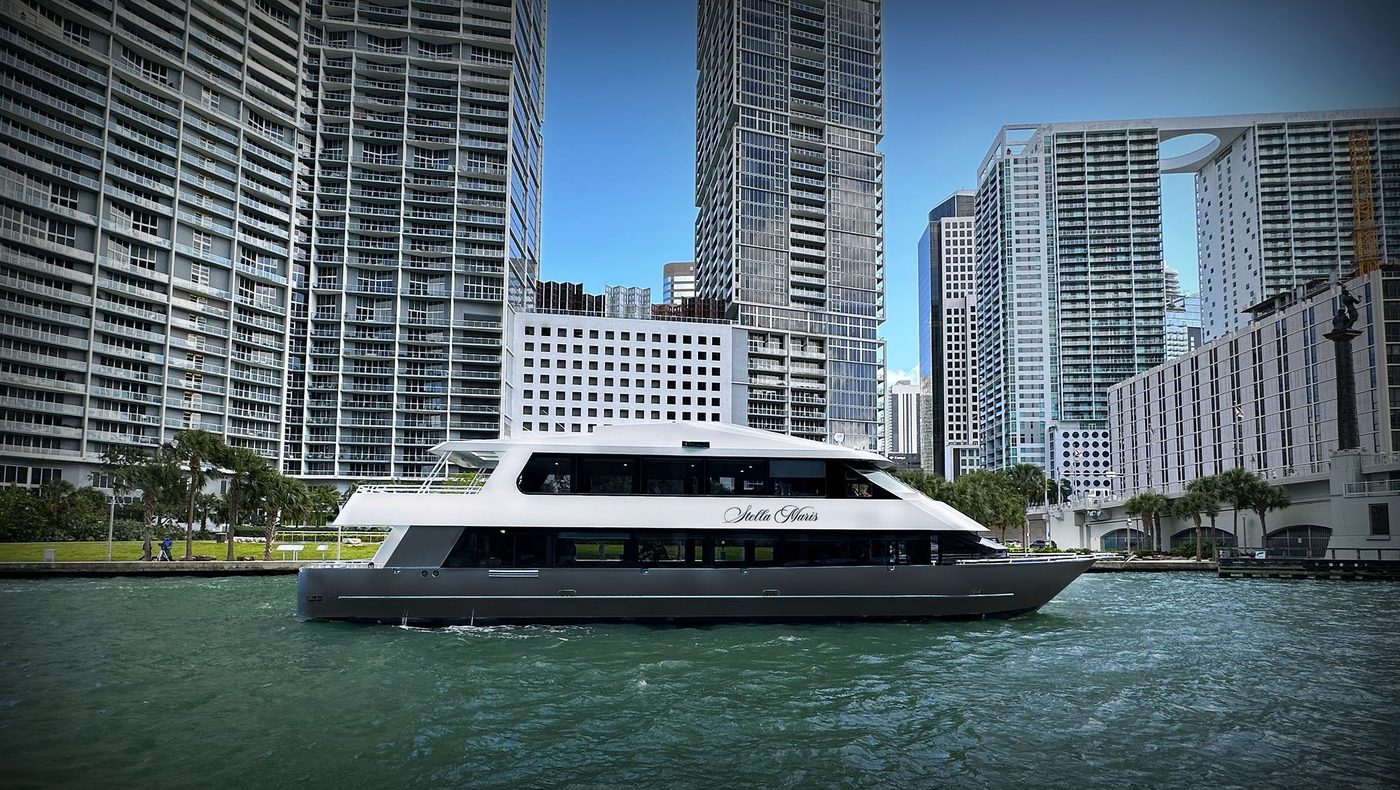 Stella Maris commercial event yacht cruising past Brickell in Miami