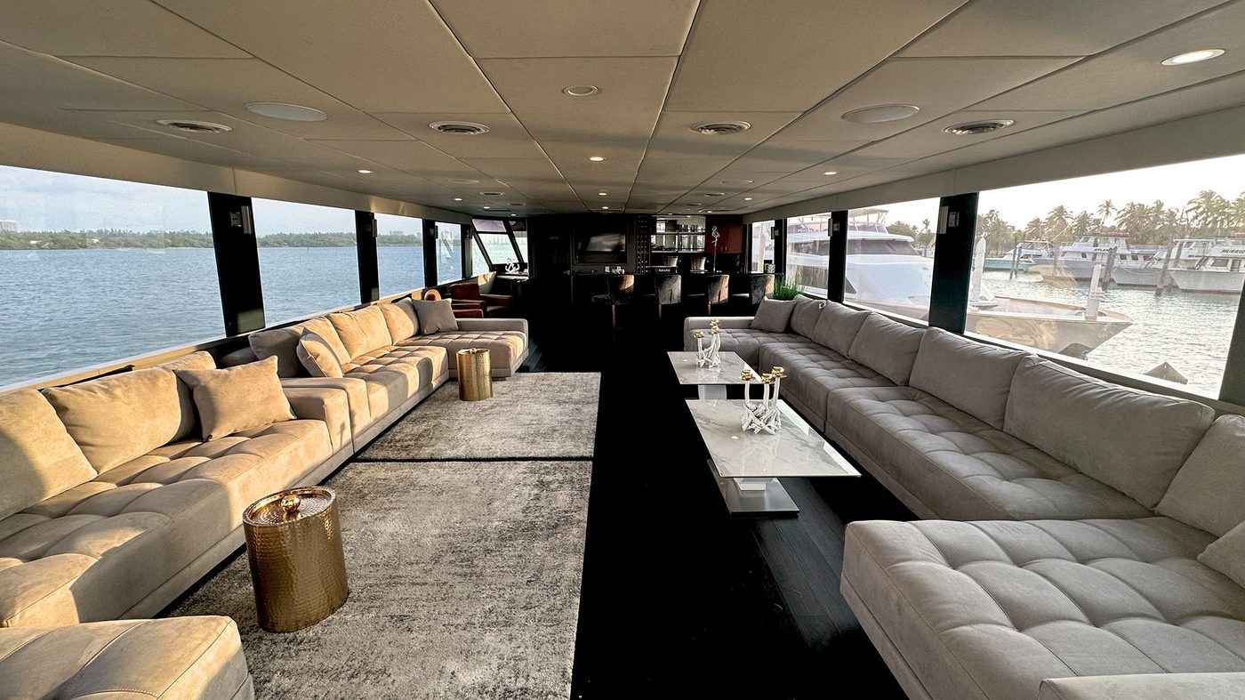 Main salon of the Stella Maris event yacht set up for a corporate function