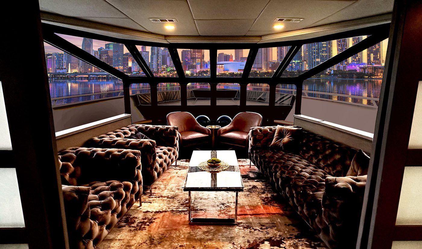 Whiskey room lounge on the Stella Maris with the Miami skyline at night