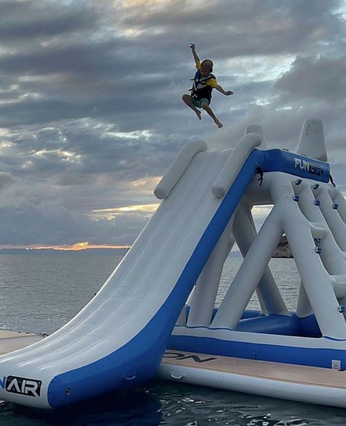 Floating water slide at a yacht party in Miami