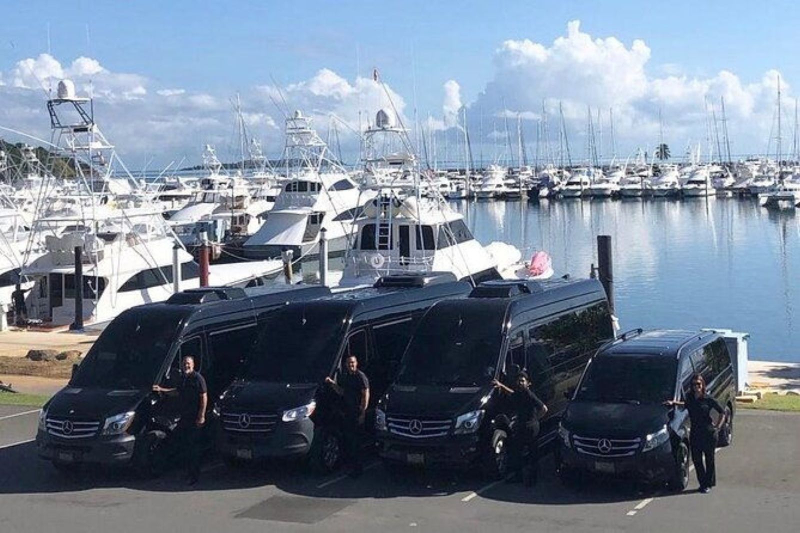 Luxury Ground Transportation — Mercedes Sprinter fleet at marina