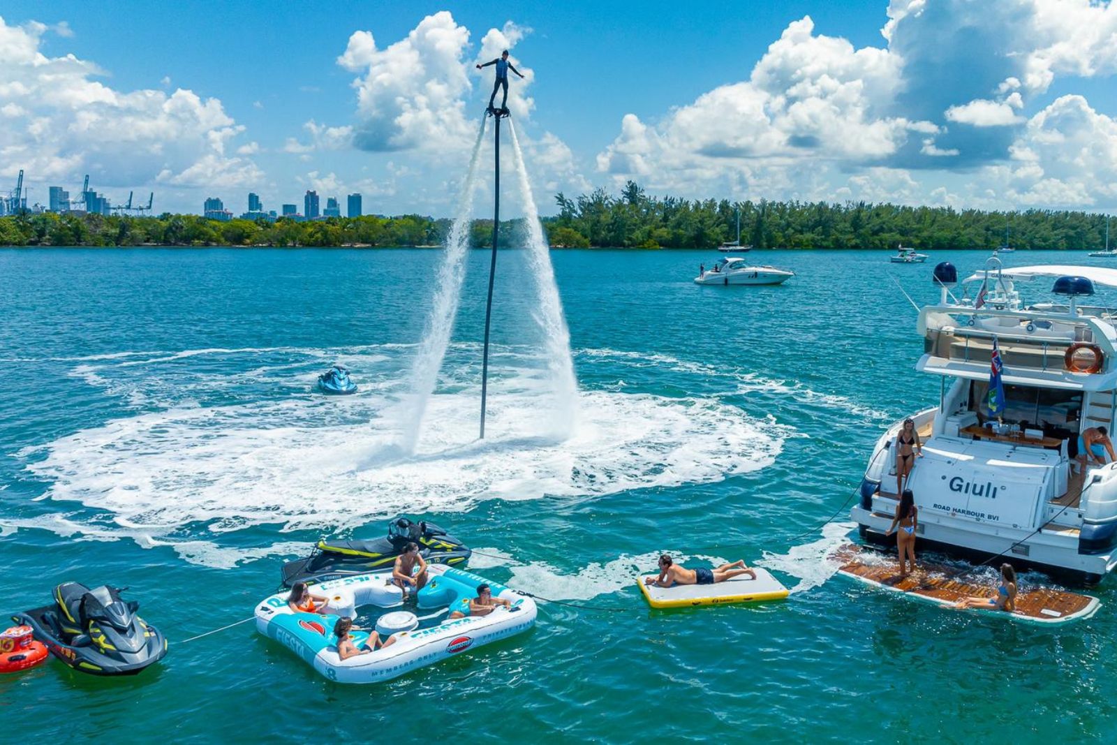 Water Toys Package — flyboard, jet skis, floats around yacht